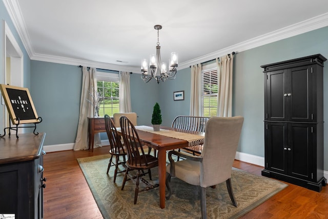 103 Crestview Cir, Greer, SC 29651 - dining room with a chandelier, wood finished floors, and ornamental molding