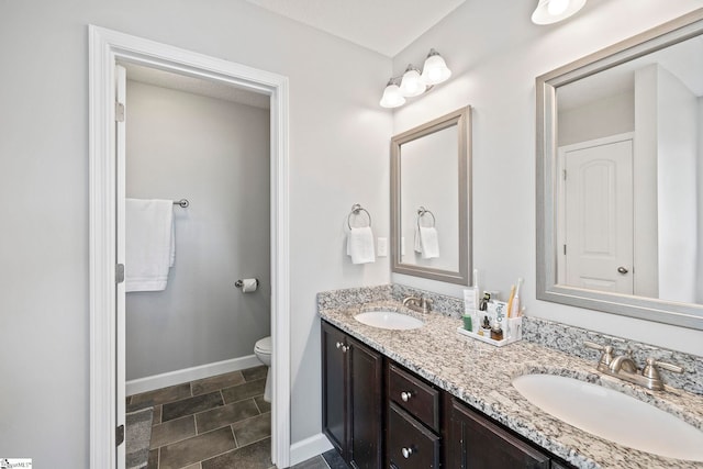 257 Highland Springs Loop, Inman, SC 29349 - bathroom featuring double vanity and baseboards