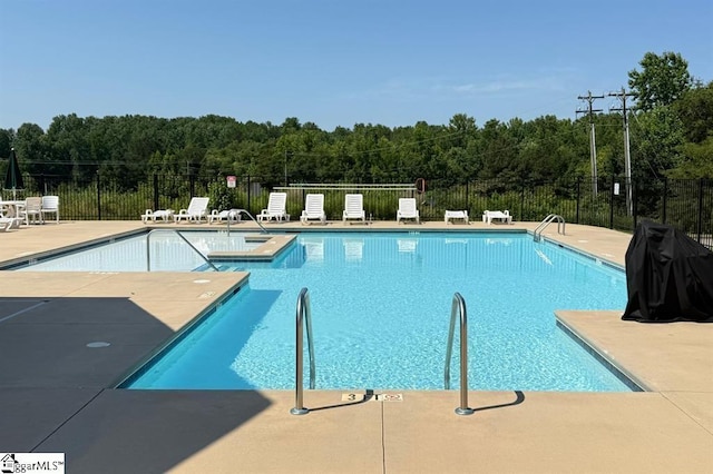 257 Highland Springs Loop, Inman, SC 29349 - community pool with a patio, a view of trees, and a jacuzzi