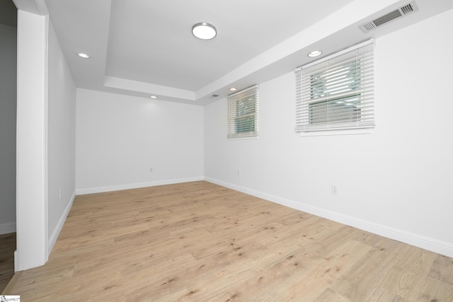 661 Maple Dr, Greer, SC 29651 - spare room featuring recessed lighting, light wood finished floors, and a tray ceiling