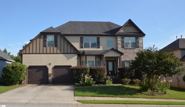 108 Dillard Creek Ct, Greer, SC 29651 - craftsman-style house with concrete driveway, an attached garage, board and batten siding, a front yard, and brick siding