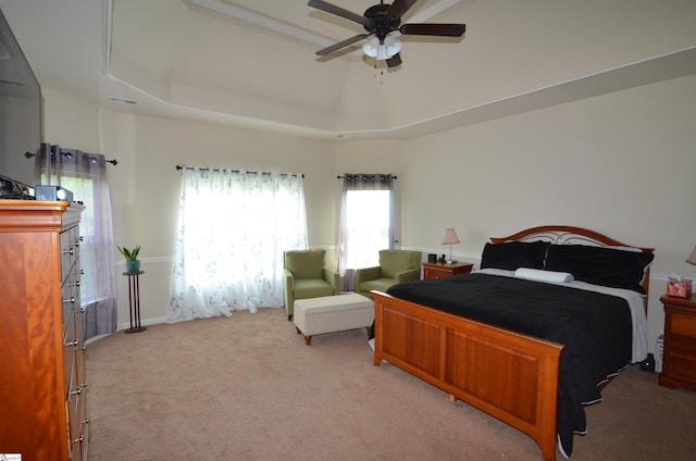 108 Dillard Creek Ct, Greer, SC 29651 - bedroom with light carpet, a ceiling fan, and a raised ceiling