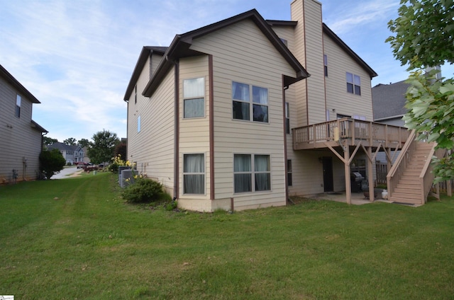 108 Dillard Creek Ct, Greer, SC 29651 - rear view of house with a wooden deck, stairway, a yard, and a chimney