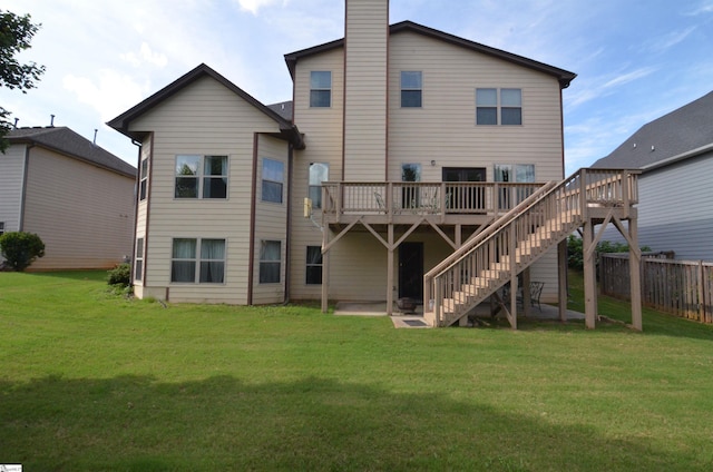108 Dillard Creek Ct, Greer, SC 29651 - rear view of house featuring a wooden deck, stairway, and a chimney
