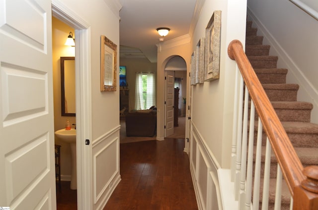 108 Dillard Creek Ct, Greer, SC 29651 - hallway with crown molding, dark wood finished floors, arched walkways, and stairway