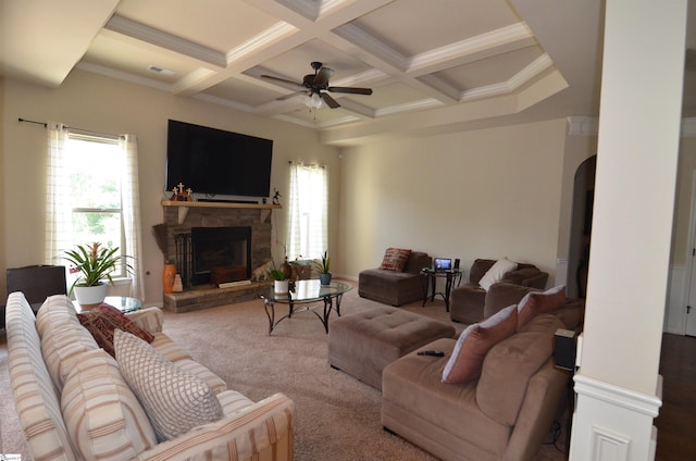 108 Dillard Creek Ct, Greer, SC 29651 - carpeted living area featuring plenty of natural light, a stone fireplace, beamed ceiling, coffered ceiling, and a ceiling fan