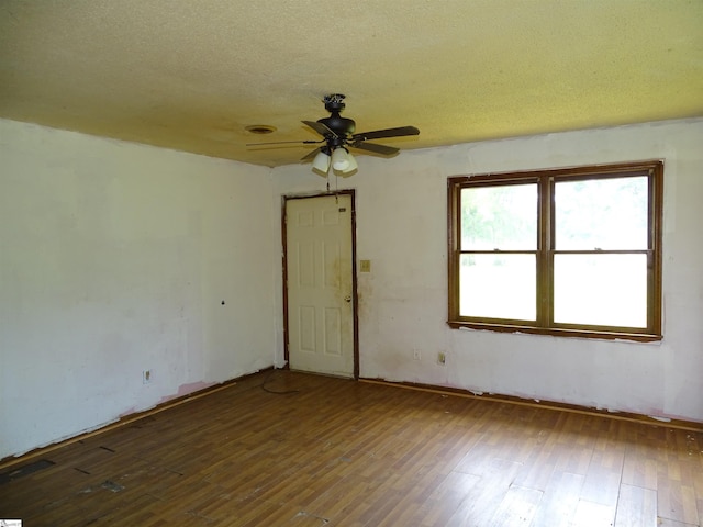 218 Wingo Rd, Wellford, SC 29385 - unfurnished room with wood finished floors, ceiling fan, and a textured ceiling