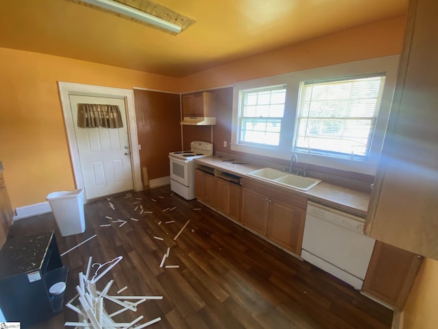 719 Chestnut St, Laurens, SC 29360 - kitchen with white appliances, dark wood-type flooring, under cabinet range hood, and light countertops