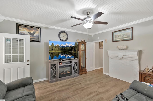 712 W Main St, Easley, SC 29640 - living room featuring a ceiling fan, crown molding, and light wood finished floors