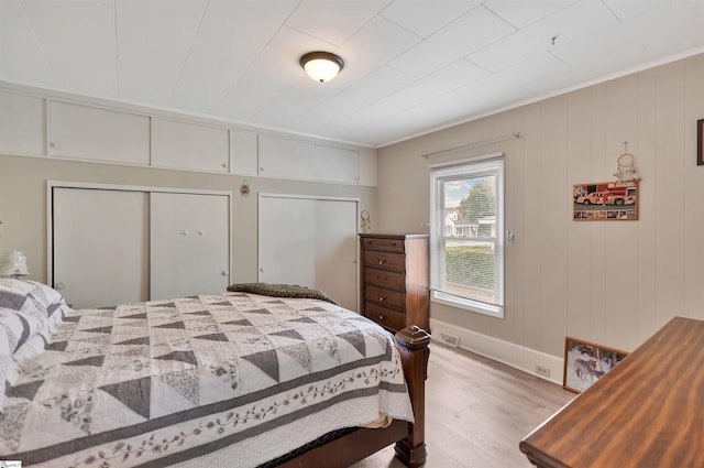 712 W Main St, Easley, SC 29640 - bedroom with light wood-type flooring and crown molding