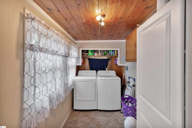 712 W Main St, Easley, SC 29640 - laundry area featuring washer and clothes dryer, wood ceiling, cabinet space, and ornamental molding