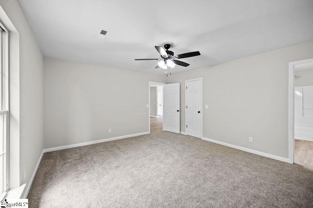 1016 Scott Rd, Anderson, SC 29621 - unfurnished bedroom featuring carpet floors, connected bathroom, and ceiling fan