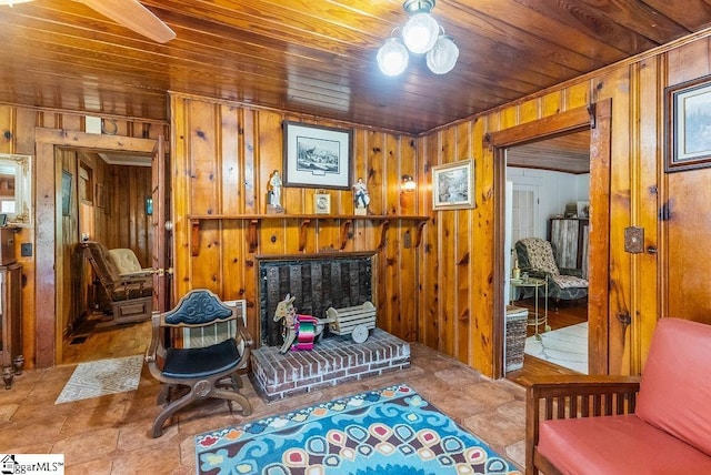 2115 Price House Rd, Woodruff, SC 29388 - living room featuring wood walls, wood ceiling, and a fireplace