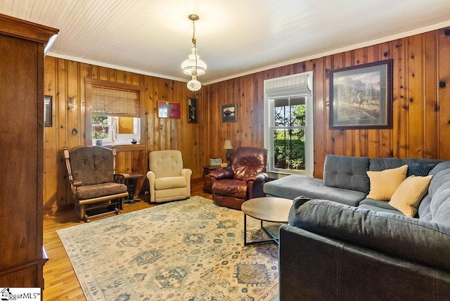 2115 Price House Rd, Woodruff, SC 29388 - living room with crown molding, wooden walls, and wood finished floors