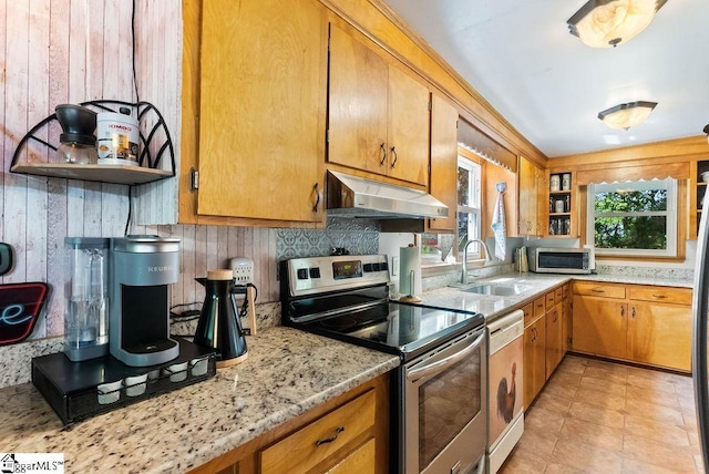 2115 Price House Rd, Woodruff, SC 29388 - kitchen featuring stainless steel appliances, under cabinet range hood, open shelves, light stone countertops, and brown cabinets