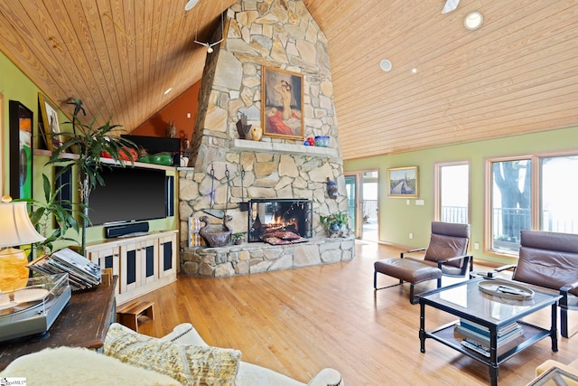902 Altamont Rd, Greenville, SC 29609 - living room featuring wooden ceiling, a stone fireplace, wood finished floors, and high vaulted ceiling