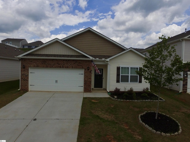 63 Oak Edge Ln, Greer, SC 29651 - view of front of house featuring brick siding, concrete driveway, an attached garage, and a front lawn