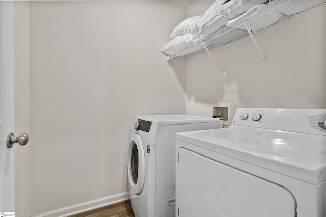314 Long Grove Ln, Greer, SC 29650 - washroom featuring washer and dryer and wood finished floors