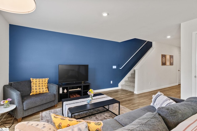 314 Long Grove Ln, Greer, SC 29650 - living room featuring stairs, wood finished floors, and recessed lighting