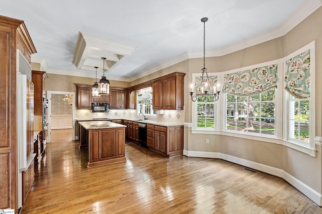 15 Annas Pl, Simpsonville, SC 29681 - kitchen with black appliances, a chandelier, hardwood / wood-style flooring, a kitchen island, and ornamental molding