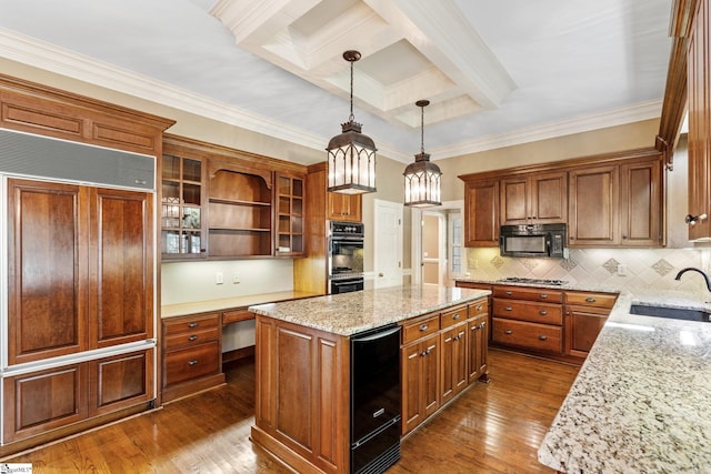 15 Annas Pl, Simpsonville, SC 29681 - kitchen featuring black appliances, a kitchen island, brown cabinets, dark wood-style floors, and open shelves