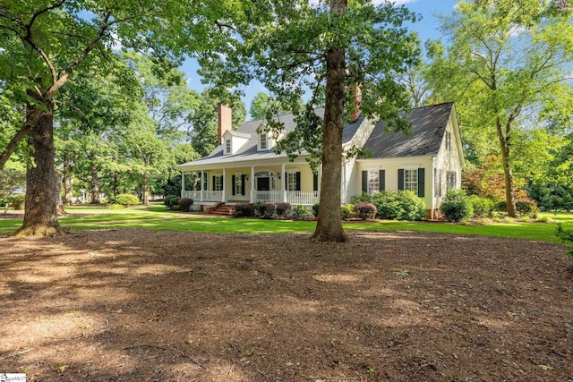 15 Annas Pl, Simpsonville, SC 29681 - cape cod-style house with a porch and a chimney