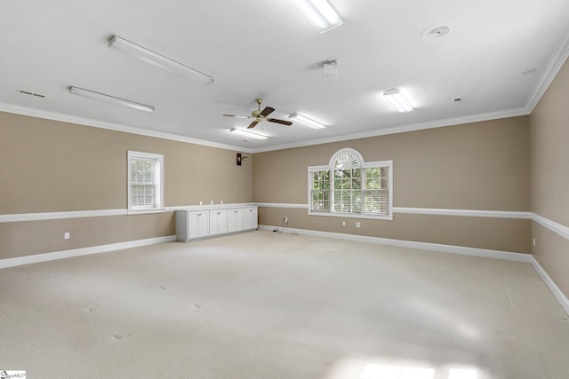 15 Annas Pl, Simpsonville, SC 29681 - empty room featuring ornamental molding, a ceiling fan, and light carpet