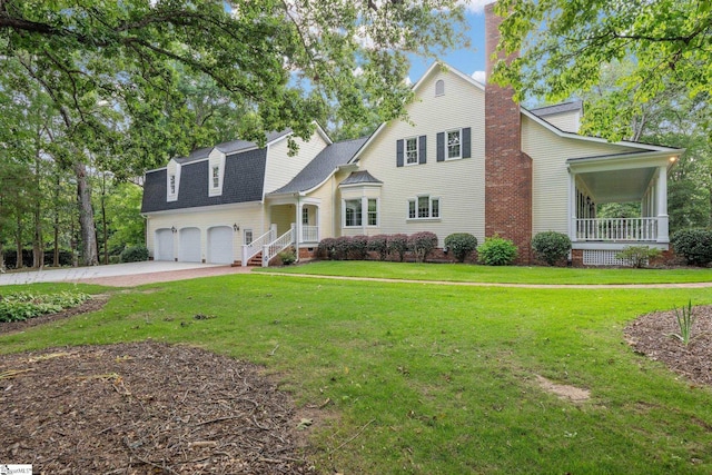 15 Annas Pl, Simpsonville, SC 29681 - view of front of home featuring driveway, a front yard, covered porch, a chimney, and roof with shingles