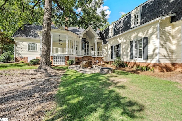 15 Annas Pl, Simpsonville, SC 29681 - back of house featuring ceiling fan, a lawn, an outdoor fire pit, and crawl space