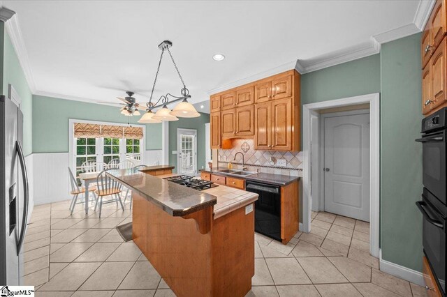 118 Glencreek Dr, Greer, SC 29650 - kitchen featuring dishwasher, stainless steel refrigerator with ice dispenser, ceiling fan, crown molding, and gas stovetop