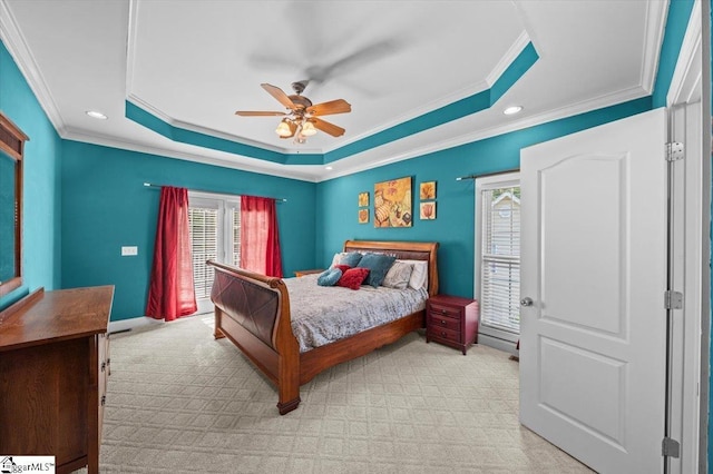 118 Glencreek Dr, Greer, SC 29650 - bedroom with crown molding, a tray ceiling, light colored carpet, recessed lighting, and ceiling fan