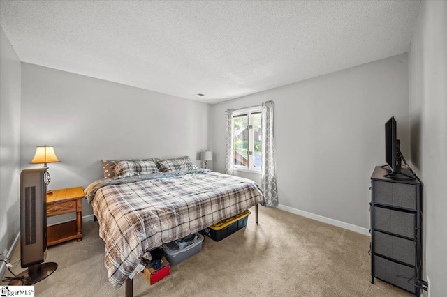 2 Creekside Way, Greenville, SC 29609 - carpeted bedroom featuring baseboards and a textured ceiling