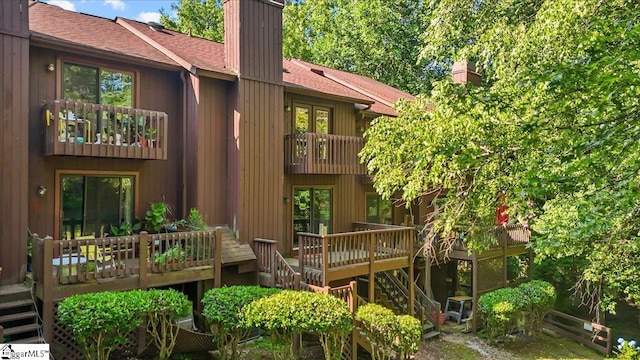 2 Creekside Way, Greenville, SC 29609 - rear view of house with a chimney, stairs, a balcony, roof with shingles, and a deck