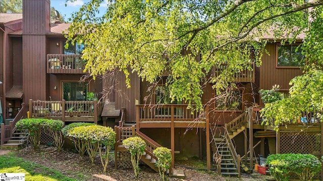 2 Creekside Way, Greenville, SC 29609 - rear view of house with stairs and a deck