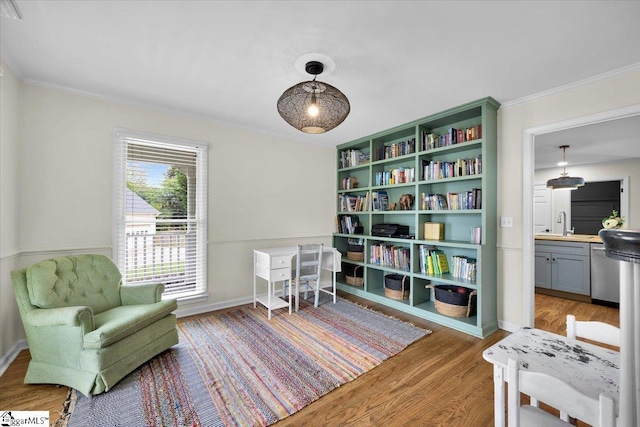 109 W Fieldsparrow Cir, Greenville, SC 29615 - sitting room with light wood-style floors and crown molding