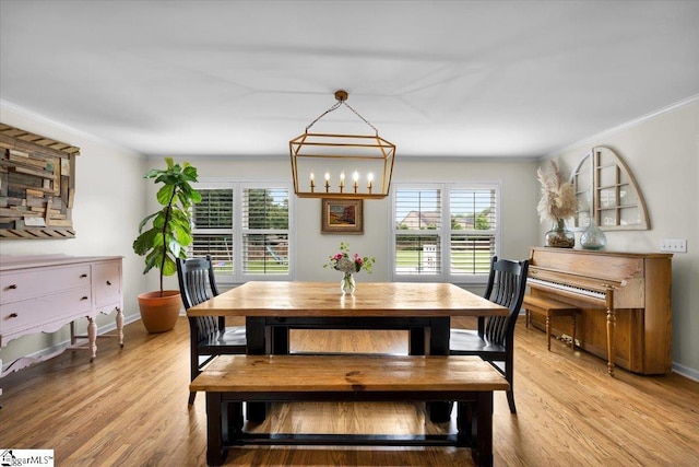 109 W Fieldsparrow Cir, Greenville, SC 29615 - dining room with ornamental molding, light wood-style flooring, and a chandelier
