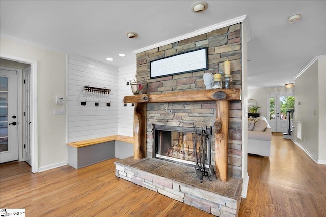 109 W Fieldsparrow Cir, Greenville, SC 29615 - unfurnished living room featuring crown molding, wood finished floors, a fireplace, and recessed lighting