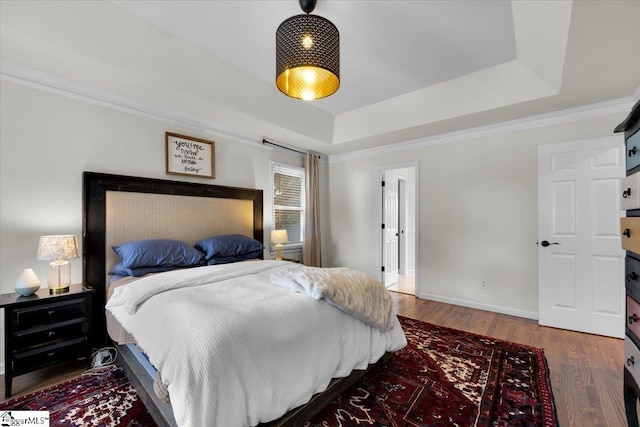 109 W Fieldsparrow Cir, Greenville, SC 29615 - bedroom featuring a raised ceiling, wood finished floors, and ornamental molding
