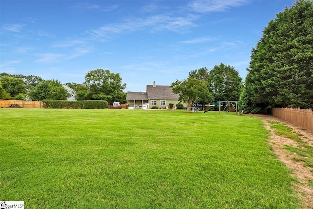 109 W Fieldsparrow Cir, Greenville, SC 29615 - fenced backyard featuring a playground
