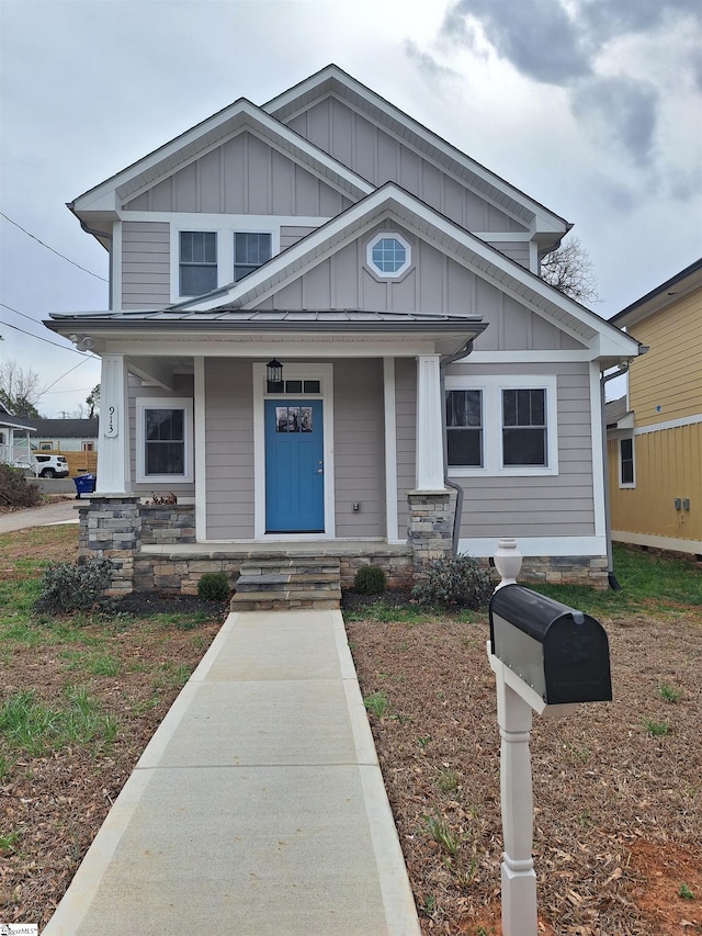 913 Dunbar St, Greenville, SC 29601 - view of front of home with board and batten siding and covered porch