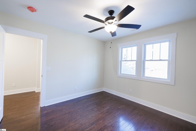 913 Dunbar St, Greenville, SC 29601 - spare room featuring dark wood finished floors and ceiling fan