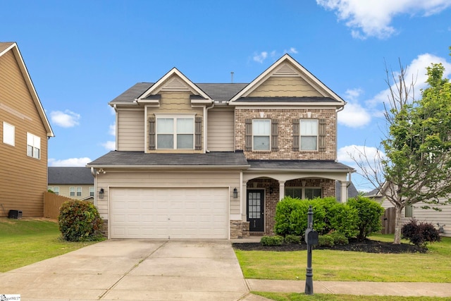 415 Bridge Crossing Dr, Simpsonville, SC 29681 - view of front of property featuring a garage, driveway, brick siding, and a porch