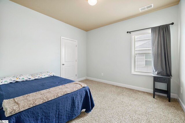415 Bridge Crossing Dr, Simpsonville, SC 29681 - carpeted bedroom featuring baseboards