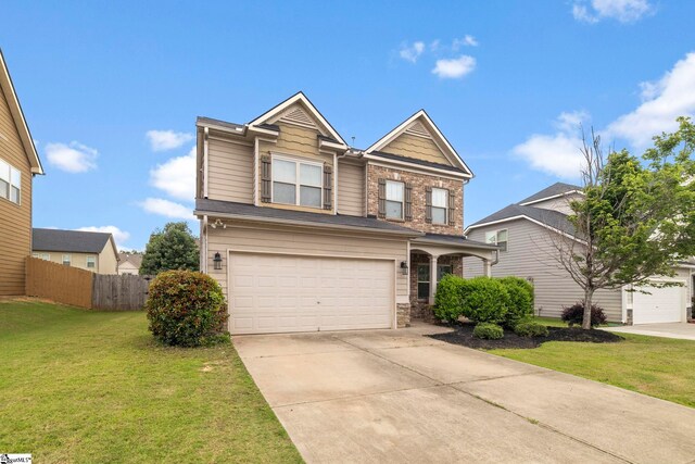 415 Bridge Crossing Dr, Simpsonville, SC 29681 - view of front of house with stone siding, an attached garage, and driveway