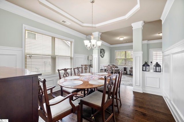 415 Bridge Crossing Dr, Simpsonville, SC 29681 - dining area with a decorative wall, wainscoting, dark wood finished floors, ornamental molding, and ornate columns