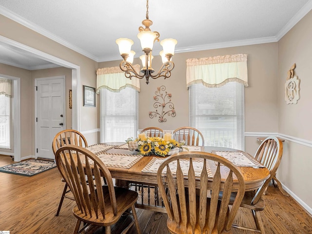 209 Thornhill Dr, Spartanburg, SC 29301 - dining area with a chandelier, wood finished floors, and crown molding