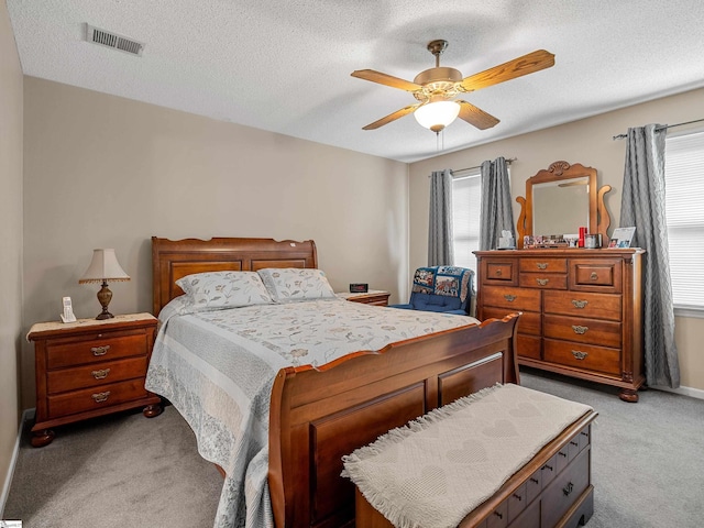 209 Thornhill Dr, Spartanburg, SC 29301 - bedroom with light carpet, ceiling fan, and a textured ceiling