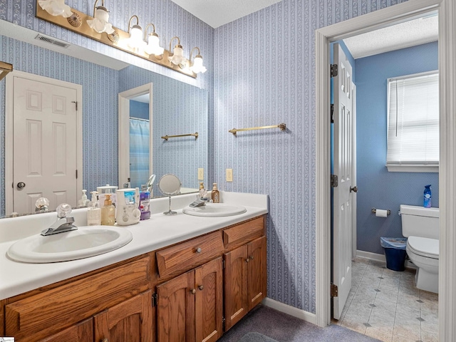 209 Thornhill Dr, Spartanburg, SC 29301 - full bath with double vanity, tile patterned floors, and a shower with shower curtain