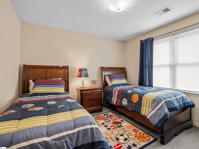 209 Thornhill Dr, Spartanburg, SC 29301 - carpeted bedroom featuring a textured ceiling