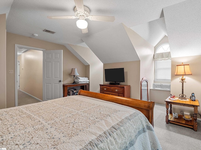 209 Thornhill Dr, Spartanburg, SC 29301 - carpeted bedroom with vaulted ceiling, ceiling fan, and a textured ceiling